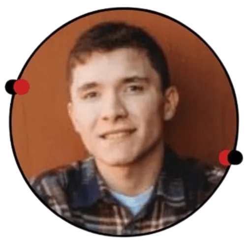 Portrait of a young man with short brown hair wearing a plaid shirt inside a circular frame
