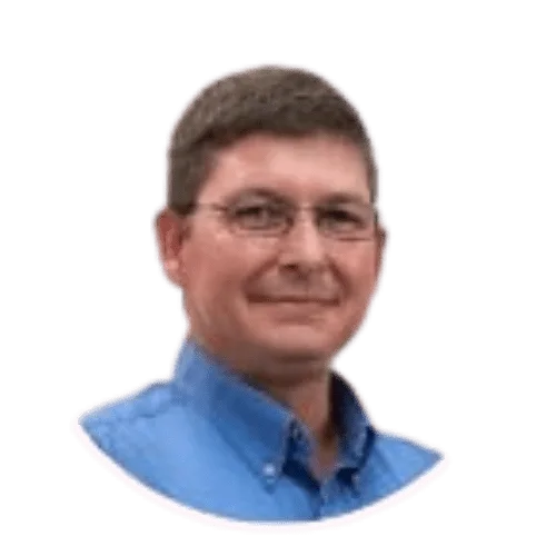 Smiling man with short brown hair and glasses wearing a blue collared shirt inside an oval cutout