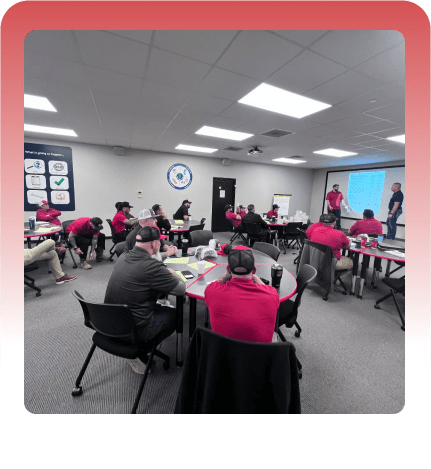 Wide view of attendees at a Lead Ninja training workshop inside a red frame